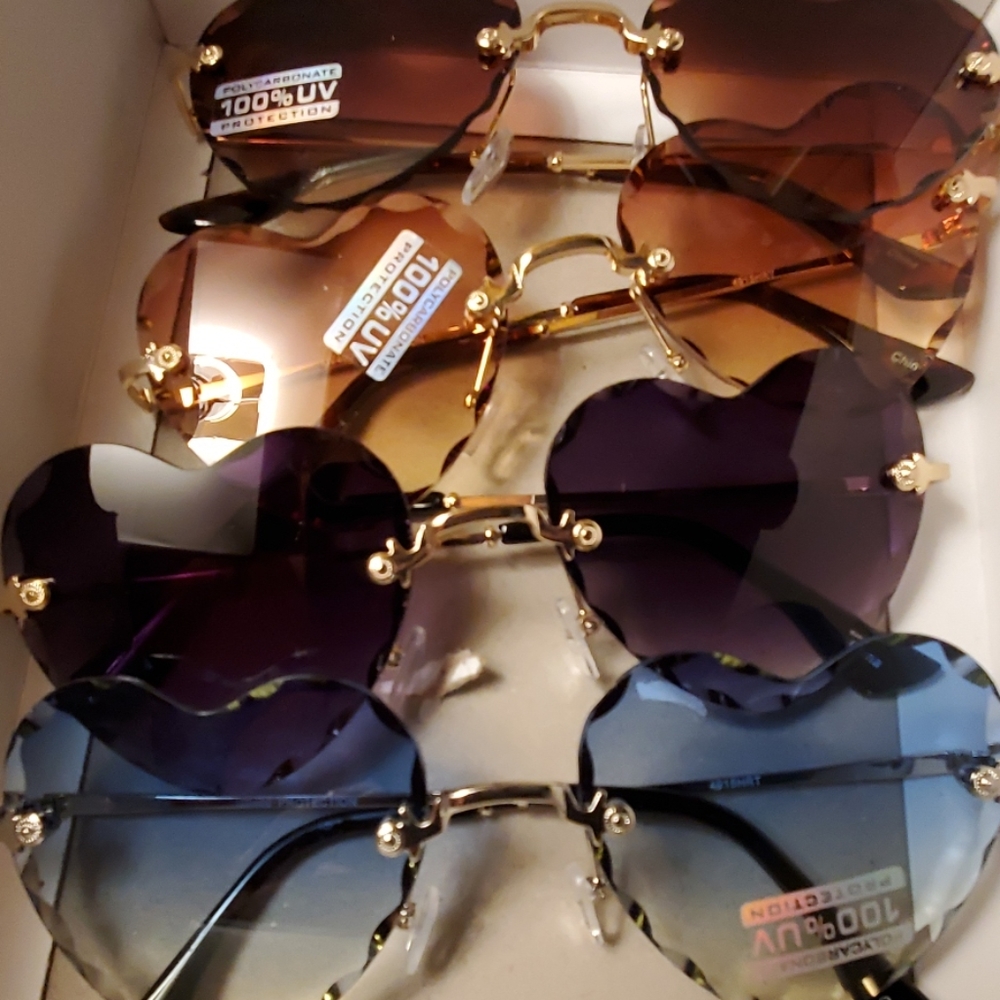 100% uv heart shape sunglasses with cut edging new